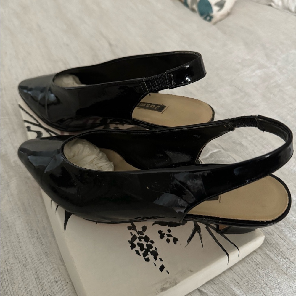 Size 9 lightly used patent leather sling backs